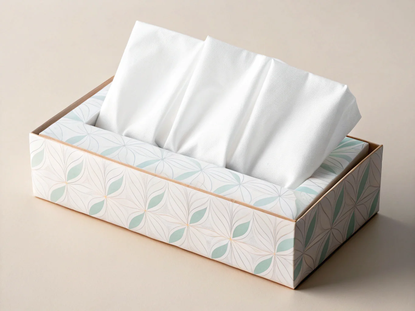 Stylish tissue box with geometric leaf design and soft white tissues